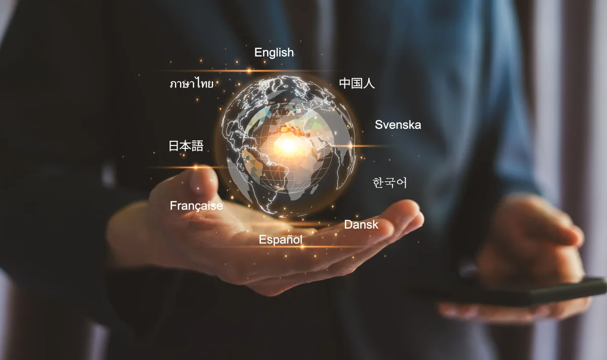 Digital image of the world globe with glowing multi-language support